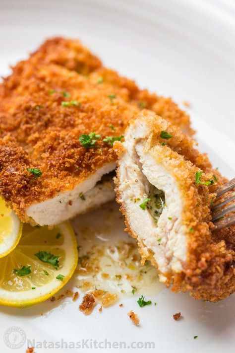 It's easier than ever to make this Chicken Kiev recipe. Slice through the crisp exterior of juicy Chicken Kiev and you'll get a stream of hot garlic butter. | natashaskitchen.com Homemade Chicken Kiev, Chicken Keiv Recipe, Kiev Recipe, Chicken Kiev Recipe, Panini Recipes Chicken, Kung Pao Chicken Recipe, Chicken Supreme, Chicken Shawarma Recipe, Chicken Kiev