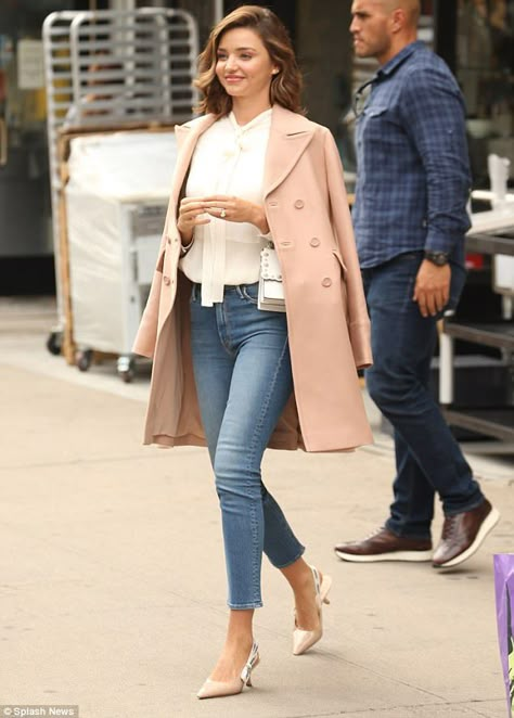 Pretty in pink: Miranda Kerr looked the epitome of elegance with a chic blush draped over her shoulders as she ran errands in Manhattan on Thursday Coat Over Shoulders, Coat On Shoulders, Miranda Kerr Outfits, Miranda Kerr Street Style, Celebrity Jeans, Soft Feminine Outfits, Miranda Kerr Style, Feminine Outfits, First Date Outfits