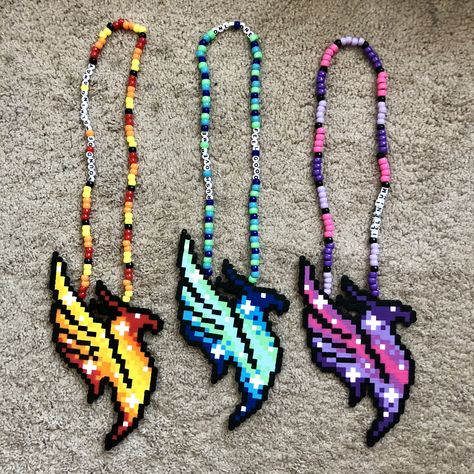 Illenium perler necklace Illenium Perler Pattern, Perler Beads Ideas Rave, Rave Perler Beads, Perler Beads Rave, Edm Perler Bead Patterns, Illenium Perler, Subtronics Perler, Rave Perler Ideas, Edm Perler