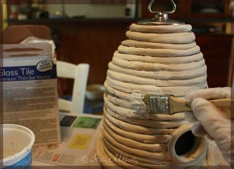 How to Make a Clay Bee Skep for a Cottage-Style Garden DIY | Hometalk Clay Bees How To Make, Clay Beehive, Bee Skep House, Diy Vanity Lights, Bee Hives Diy, Bee Decorations, Beehive Art, Bee Skeps, Rustic Wood Lanterns