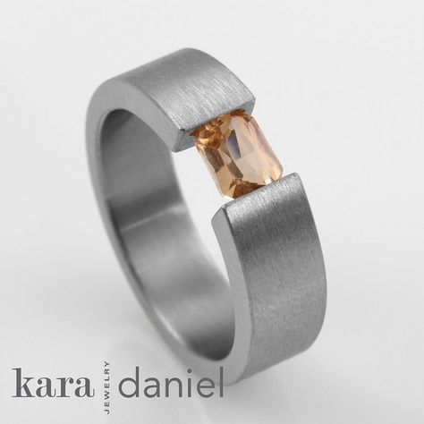 peach sapphire ~ stainless steel tension- set band by kara | daniel, via Flickr Celebrity Rings, Silver Wire Rings, Ethical Engagement Ring, Peach Sapphire, Wire Rings, Mens Silver Rings, Love Ring, Contemporary Jewellery, Elegant Jewelry