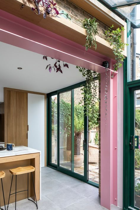 Kitchen-diner renovation with pink steel beams and fluted units Creative Brief, House Extension Design, Steel Beams, Artist House, House Extensions, Kitchen Diner, Terrace House, Glass Doors, Moss Green