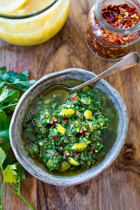 A delicious use for Preserved Lemons, this herby, zesty Preserved Lemon Gremolata w/ parsley, olive oil  & garlic is tasty over grilled fish, or meat or grilled veggies, or tossed with beans or pasta!  Fresh and flavorful!  #preservedlemon #preservedlemons Lemon Gremolata Recipe, Preserved Lemon Recipes Using, Recipes With Preserved Lemons, Preserved Lemons Uses, Parsley Uses, Lemon Gremolata, Preserved Lemons Recipes, Gremolata Recipe, Feasting At Home