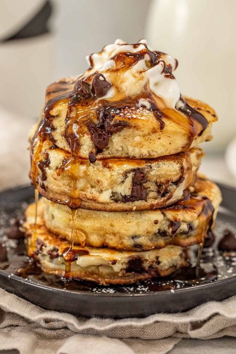 An easy recipe for soft, fluffy, and absolutely delicious chocolate chip pancakes! A simple pancake batter loaded with chocolate chips, a great pancake recipe. Buttermilk Chocolate Chip Pancakes, Pancake Chocolate Chip, Fluffy Chocolate Chip Pancakes, Chocolate Chips Pancakes, Chocolate Chocolate Chip Pancakes, Chocolate Chip Banana Pancakes, Pancake Cookies, Chocolate Chip Pancake, Chocolate Chip Pancakes Recipe