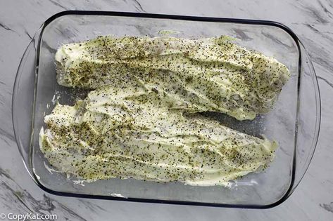 Enjoy flaky, baked white fish with a tasty crust for dinner. Use tilapia, cod, haddock, or your favorite white fish. A simple breaded seafood filet is topped with mayonnaise and seasoning then baked and broiled to perfection. Get this quick and easy Luby's copycat recipe. #fishrecipes #bakedfish #seafoodrecipes #tilapia #ovenbaked #copycat #copycatrecipes #quickandeasy Copycat Lubys Baked Fish, Lubys Baked White Fish, Luby’s Baked White Fish, Haddock Fish Recipes Baked, Cod Fish Recipes Baked With Mayo, Lubys Fried Fish Recipe, White Fish Recipes Baked, Whiting Fish, Cod Fish Recipes Baked