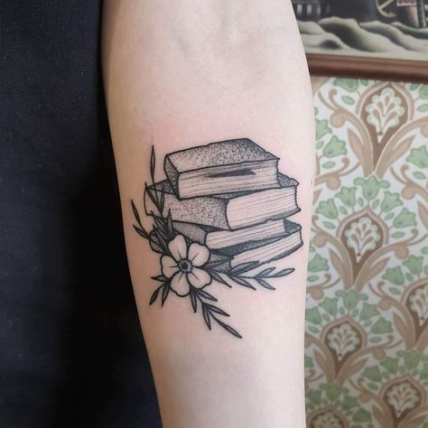 #booktattoo American Traditional Book Tattoo, Bookshelf Tattoo, Stack Of Books Tattoo, Open Book Tattoo, Book Tattoo Ideas, Reading Tattoo, Books Tattoo, Indian Feather Tattoos, Cousin Tattoos