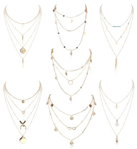 PRICES MAY VARY. Layered Necklace Set:One Order Includes 7PCS Gold Tone Dainty Layered Necklaces, Which Combine the Most Fashionable Elements:Star, Ball, Horn, Infinity, Leaf, Bead, Feather, Shell, Circle, Bar and Coin Charm, Perfect Layering Necklaces for Women and Girls Multi Layered Necklaces:5PCS 3 Layer Necklaces and 2PCS 4 Layer Necklaces, Easy to Match Any Outfits, Especially V-neck Tops Size&Material:Each Layered Necklace With 2"(5CM) Extender Chain, Adjustable Length, Fit for Most of Pe 3 Layer Necklace, Circle Bar, Coin Pendant Necklace, Layered Necklace Set, Multi Layer Necklace, Pendent Necklace, Stacked Jewelry, Gold Necklace Layered, Chain Jewelry