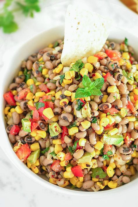 Zesty Black-Eyed Pea and Corn Salsa Recipe is a breeze to make and is bursting with fresh, vibrant flavors. Bring out a bag of your favorite tortilla chips and watch it disappear. #glutenfree #veganappetizer, #gamedayappetizer #partytime Peas And Corn, Black Bean Salsa Recipe, Black Eyed Pea Salad, Black Eyed Peas Recipe, Salsa Party, Corn Salsa Recipe, Black Eyed Pea, Canned Green Chilies, Black Bean Salsa