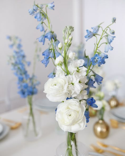 Simple Blue And White Flower Arrangements, Bus Vase Centerpiece, Blue And Red Floral Arrangements, Blue And White Luncheon Decor, Small Blue Flower Arrangements, White Florals With Blue Accents, Blue Vase White Flowers, Blue And White Vase Arrangement, Blue Wedding Flower Centerpieces