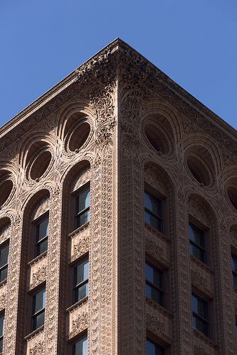 Louis Sullivan, The Guaranty Building, 1895-6.  The detail work on the outside of this building is beautiful.  Seems like a cross between Gothic and modern architecture. Guaranty Building, Roof Cap, Louis Sullivan, Industrial District, Chicago School, Brick Cladding, Steel Frame Construction, Brick Architecture, Chicago Architecture