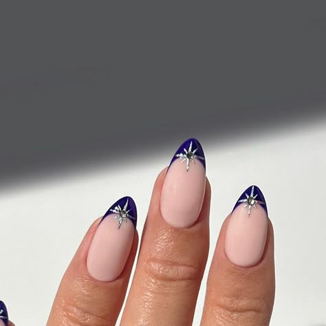 Marnie 🍒🌸🦋🌈✨ on Instagram: "Midnight blue tips centred with shimmering stars 💙✨💍  #nails #nailinspo #nailart #naildesign #winternails #autumnnails #fallnails" Midnights Nails Inspired, Navy Celestial Nails, Navy New Years Nails, Navy Tip Nails, Midnight Blue Almond Nails, Christmas Nails Navy Blue, Blue Nails With Star Design, Midnight Nails Design, Midnight Rain Nails