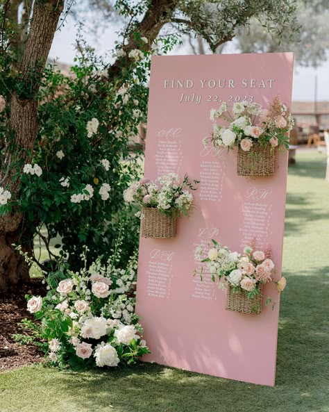 The Lovely List: Wedding Inspo We're Loving Lately Seating Chart Flowers Wedding, Blush Wedding Signage, Wedding Sign And Seating Chart, Spring Seating Chart Wedding, Pink Wedding Signs, Pastel Wedding Seating Chart, Pink Wedding Seating Chart, Wedding Seating Chart With Flowers, Spring Seating Chart