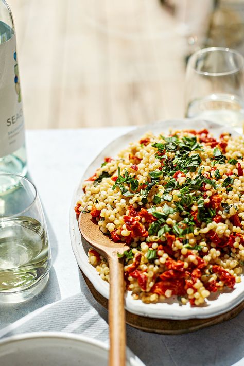 Pearl Couscous Salad with Sun-Dried Tomatoes | Good Life Eats Sundried Tomato Couscous, Pearled Couscous Recipes, Couscous Pasta Salad, Mediterranean Sides, Pearl Couscous Recipes, Summer Entrees, Summer Entertaining Recipes, Pearl Couscous Salad, Couscous Salad Recipes