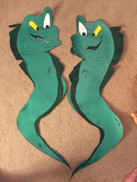 Eels from Little Mermaid I made for trunk or treat. Flotsam and Jetsam Ursula’s Eels, Ursula Door Decoration, Ursula Decorations Diy, Trunk Or Treat Ursula, Flotsam And Jetsam Diy, Little Mermaid Homecoming Float, Little Mermaid Hallway Decorations, Eel Costume Little Mermaid, Ariel Trunk Or Treat Ideas