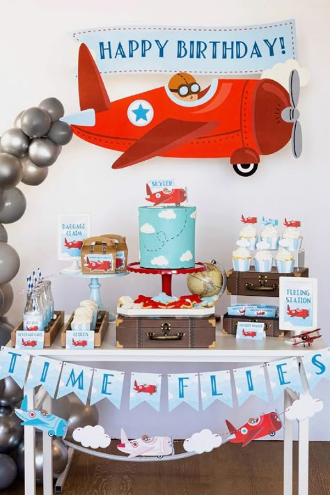 Prepare for takeoff at your airplane-themed party for a sky-high adventure! Transform your party space into an airport with airplane decorations and activities. From boarding passes to inflight entertainment, your little pilots will be flying high. With airplane snacks and turbulence-free games, maybe even a bouncy castle, this party will be soaring with excitement! Boy 2nd Birthday Party Ideas, Time Flies Birthday Party, Airplane Decorations, 2nd Birthday Party Ideas, Airplane Birthday Theme, Airplane Party Theme, Vintage Airplane Birthday Party, Vintage Airplane Party, Vintage Airplane Birthday