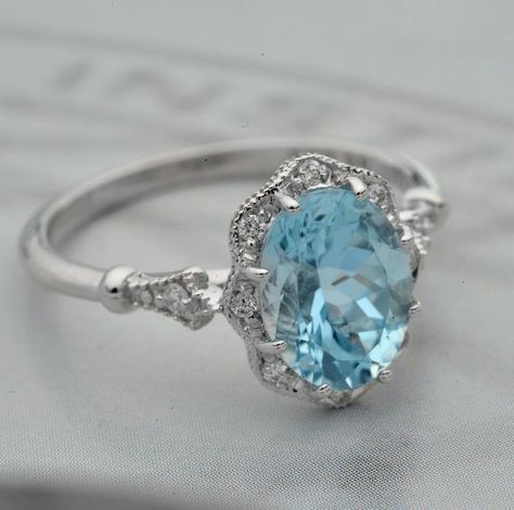 Halo engagement ring with a natural blue aquamarine or Pink | Etsy Cinderella Engagement Rings, Aquamarine Engagement Ring Vintage, Oval Halo Engagement Ring, Vintage Inspired Engagement Rings, Flower Halo, Engagement Rings Vintage Halo, Engagement Ring Vintage, Aquamarine Engagement Ring, Engagement Ring White Gold