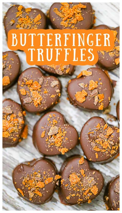 Butterfinger Truffles - These Butterfinger truffles will vanish before you know it! These delicious creamy, bite-sized confectionary peanut butter truffles are made with crunchy Butterfinger candy bits and dipped in a rich chocolate!  Easy to make for a wonderful sweet treat that is sure to become of family favorite. #butterfinger #candy #candytruffles #truffles #peanutbutter #peanutbuttertruffles #holidaytruffles #dessert #holidaytreats #valentinesdaytruffles #heartcandies #hearttruffles #party Butterfinger Truffles, Peanut Butter Chocolate Desserts, Truffles Peanut Butter, Butterfinger Candy, Dessert Truffles, Peanut Butter Truffles, Chocolate Candy Recipes, Candy Truffles, Candy Recipes Homemade