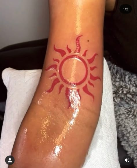 Red sun tattoo 🌞 Red Ink On Black Women, Red Ink Tattoo Ideas For Men, Red Ink On Brown Skin Tattoo, Fiery Sun Tattoo, Novacane Tattoo, Red Sun Tattoo Black Women, Sun Red Tattoo, African Sun Tattoo, Red Chest Tattoo Female