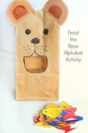 This bear alphabet activity is an excellent way to teach letter recognition and letter sounds to preschoolers. It's a great ABC activity for a bear theme! Activities With Brown Paper Bags, Letter B Prek Activities, B Is For Bear Preschool, Feed The Bear Game, Letter B Games For Preschool, Bear Unit Preschool, Bear Games Preschool, B Letter Activities For Preschool, Bear Gross Motor Activities