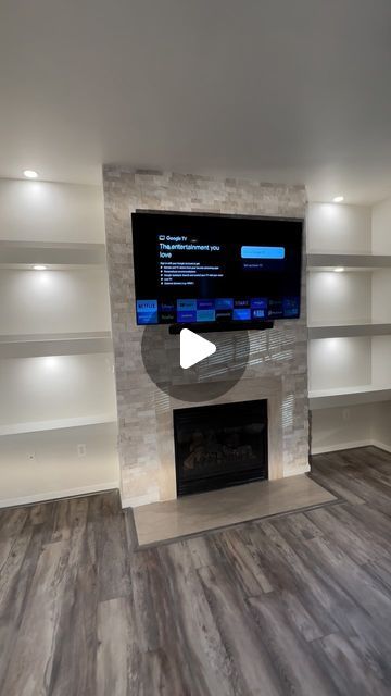 @ndz.interior on Instagram: "Fireplace upgrade with stone, shelving and dimmable controlled led lighting added 😮‍💨
•
•
•
#interiordesign #trendingaudio #explorepage✨ #explore #fyp #trendingreels #hgtv #homeideas #homeimprovement" Fireplace Upgrade, Shelves Lighting, Fireplace Shelves, Shelf Lighting, Led Lighting, Basement, Fireplace, Home Improvement, Shelves