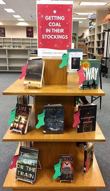 By Michelle Reid Thanks to Michelle for sharing her Christmas display idea - great to see something a bit different!Here are her comments:'This year I flipped our holiday-themed display to feature cha Library Ornaments, Book Display Ideas Library, Library Aide, Christmas Library Display, Fall Library Displays, Teen Library Displays, Readers Advisory, School Library Book Displays, Winter Displays