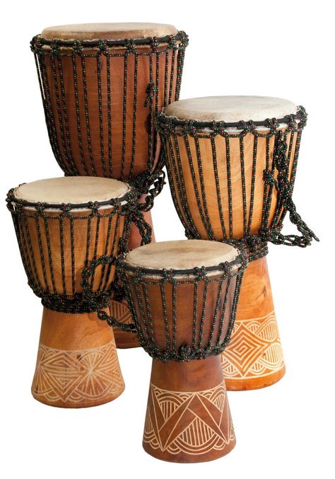 Explore the rhythmic world of drumming with our Djembe Beginner carved from Indonesia. Crafted specifically for beginners, this Djembe offers an excellent entry point into the captivating world of percussion. Each drum is meticulously carved from a single piece of mahogany wood, showcasing intricate designs that add a touch of cultural elegance. No two drums are alike, as the complex carvings on the bottom make each piece truly unique. Featuring a popular white goatskin head, this Djembe deliver Djembe Drum, African Drum, Didgeridoo, Hand Drum, African Decor, African Culture, Mahogany Wood, Percussion, Musical Instruments