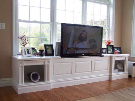 Tv On Window Wall, Cabinet Window Seat, Tv Infront Of Windows, Tv In Front Of Window, Condo Layout, Tv Rack Design, Siting Room, Hidden Tv Cabinet, Tv Unit Bedroom