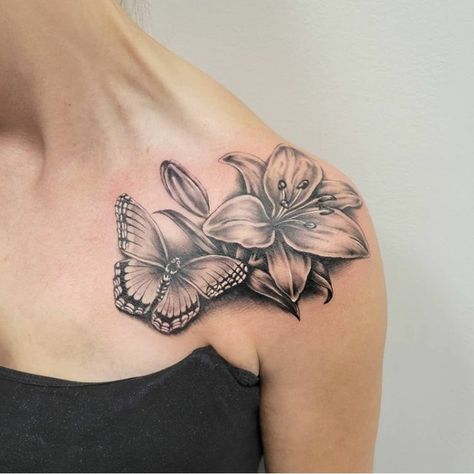 Lily Chest Tattoo Female, 3d Lily Tattoo, Stargazer Lily Tattoo Shoulder, Lilie Flower Tattoo Design, Butterfly And Lily Tattoo For Women, Lily And Butterfly Tattoo For Women, Shoulder Cap Tattoos For Women Flower, Lilly Neck Tattoo, Waterlily Tattoos For Women