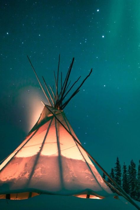 Glowing tipi / teepee in the snowy forest under the northern lights, Yellowknife, Northwest Territories, Canada Northwest Territories, Snowy Forest, The Northern Lights, Snowy Mountains, Outdoor Gear, Finland, Northern Lights, Tent, Forest