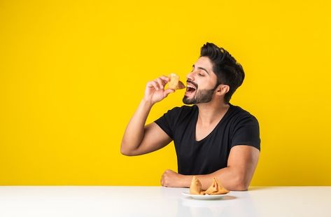 Handsome indian bearded young man eating... | Premium Photo #Freepik #photo #man-eating #hungry-man #person-eating #man-portrait Person Eating, Hungry Man, Man Pose, Lotus Rangoli, Man Eating, Healthy Man, Happy Images, Man Portrait, Man Food