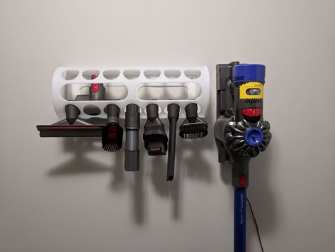 This $2 plastic bag holder from Ikea makes a great Dyson tools holder Ikea Plastic Bag Holder Ideas, Vacuum Attachment Storage Ideas, Dyson Organizer, Dyson Organization, Dyson Storage Ideas, Dyson Vacuum Storage, Dyson Vacuum Storage Ideas, Dyson Storage, Vacuum Cleaner Storage