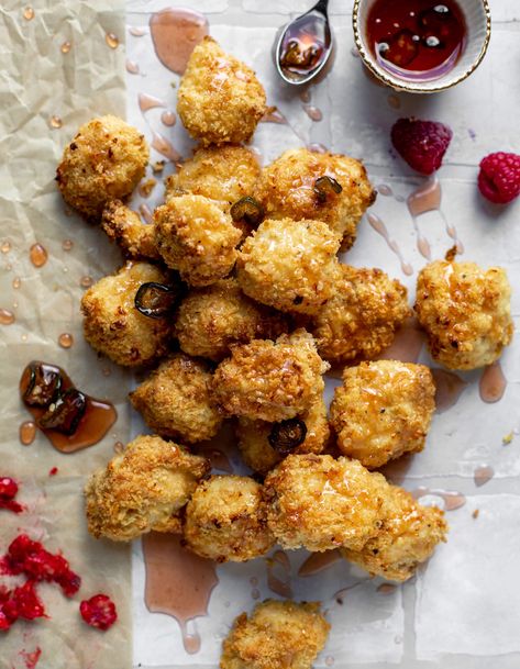 Baked popcorn chicken is super crispy and crunchy and baked! Serve with a drizzle or dip of fresh raspberry hot honey for extra zing. Baked Popcorn, Crispy Chicken Bites, Purple Popcorn, Nugget Recipes, Baked Crispy Chicken, Chicken Photography, Baked Popcorn Chicken, Pretzel Crusted Chicken, Honey Popcorn