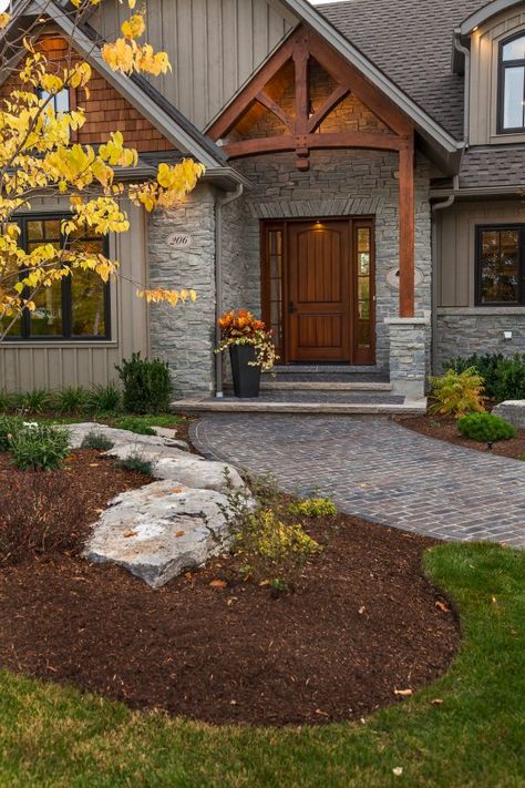 15 Enticing Rustic Entrance Designs That Will Tempt You To Go In Wood Front Door Stone House, Rustic Exterior Doors Entryway, Mountain Lodge Front Door, Log Home Entryway Front Entrances, Log Cabin Doors Entrance Front Entry, Front Entrance Ideas Exterior, Front Entrance Decor, Rustic Front Porch, Unique Front Doors