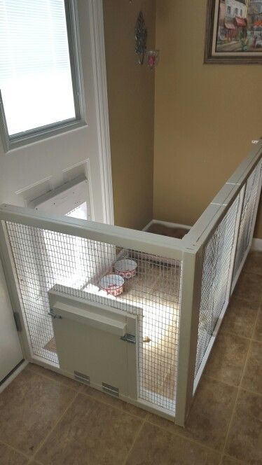 Dog gate with doggie door. Keeps the house clean & gives the dog access to inside/outside while we're gone. #gate Dog Kennel Ideas, Kennel Ideas, Diy Dog Kennel, Dog Spaces, Dog House Diy, Dog Area, Tumblr Art, Dog Rooms, Dog Gate