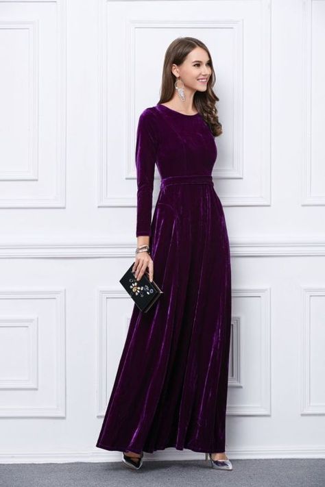 Dress in a purple velvet evening dress to look truly gorgeous. For footwear go down the casual route with metallic leather pumps.   Shop this look on Lookastic: https://lookastic.com/women/looks/evening-dress-pumps-clutch/23138   — Silver Earrings  — Purple Velvet Evening Dress  — Gold Bracelet  — Black Embellished Clutch  — Silver Leather Pumps Dresses Long Elegant, Velvet Evening Dress, Velvet Dress Long, Gaun Fashion, Velvet Clothes, Construction Birthday, Stylish Party, Kitenge, Velvet Fashion