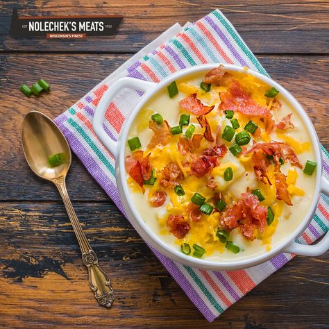 Nothing says winter comfort like a toasty-warm bowl of soup, especially our hearty Loaded Baked Potato Soup with all of the fixings! The crispy crown jewel of this steamy winter dish are the savory bits of Nolechek’s Hickory Smoked Honey Cured Bacon that we generously sprinkle on top of each bowl, plus the melty Wisconsin Cheddar Cheese we like to heap on top. Easy to make and even easier to love, this potato soup recipe is one of our all-time favorites and we know everyone at your house will Recipe Low Calorie, Leftover Baked Potatoes, Low Calorie Baking, Homemade Potato Soup, Loaded Baked Potato Casserole, Baked Potato Soup Recipe, Making Baked Potatoes, Mashed Potato Casserole, Healthy Potatoes