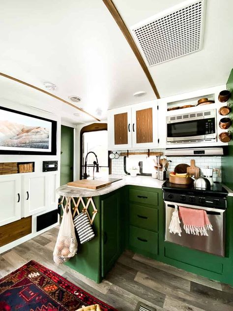 Camper Renovation DIY you must see! Fabulous trailer reno. Bold colors and such cute little details. #camperrenovation #camperreno #rvrenovation #bohorvreno #rvtransformation #rvreno #campermakeover Extra Space Storage, Diy Camper Remodel, Rv Kitchen, Rv Homes, Diy Dining Table, Diy Dining, Rv Renovations, Space Storage, Camper Makeover