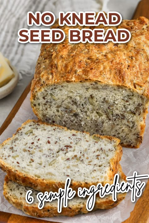 This easy no-knead seed bread is the perfect homemade recipe for soft, fluffy bread with a crispy crust. Made with a simple mix of flour, seeds, and yeast, it's great for sandwiches, toast, or any meal! Ready with minimal effort and no special tools needed. #homemadebread #nokneadbread #easyrecipes #seedbread #baking via @aylarianne Seedy Bread Recipe, Bread With Seeds Recipe, No Knead Seeded Bread, Oat Bread Recipe No Flour, No Flour Bread, Soft Fluffy Bread, Seed Bread Recipe, Bread Flour Recipe, Oat Bread Recipe