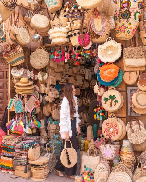 Straw bags in the Marrakech Souk. I chose the one I’m Holding here and purchased another as a gift for my sister. Souk Marrakech, Marrakech Souk, Visit Marrakech, Painted Ceramic Plates, Morocco Travel, Marrakech Morocco, Boho Bags, Straw Bags, Basket Bag