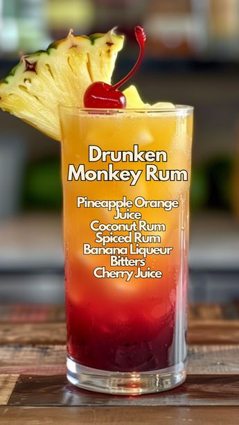 Crafting the Drunken Monkey Rum Cocktail always brings a smile to faces around here. With its rich blend of pineapple-orange juice, coconut rum, banana and spiced rum, it’s like a tropical getaway with a kick. #drunkenmonkeyrum Mixed Drinks With Spiced Rum, Mixed Drinks With Coconut Rum, Drunken Monkey Drink, Banana Rum Drinks, Drinks With Banana Liquer, Rum Cocktails Easy, Spiced Rum Cocktails, Fun Drinks Alcohol, Cocktail Drinks Alcoholic