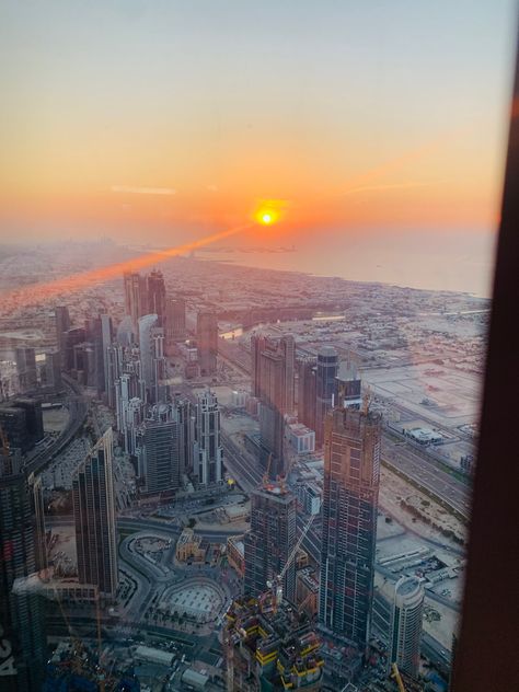 The sunset from Burj Khalifa🌇 Top Of Burj Khalifa, Sunset Snap, Sunset View, Sunset Views, Burj Khalifa, The Sunset, Dubai, Travel, Quick Saves