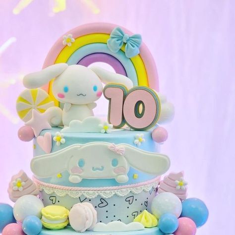 Jo Ann Marasigan Tuazon on Instagram: "Step into a world of whimsy and wonder with our enchanting Sanrio Cinnamoroll 2-tiered cake set, meticulously crafted with love and adorned with intricate details. Surrounding the centerpiece cake are an array of irresistible cupcakes and cake pops, each bursting with flavor and charm. From the soft pastel hues to the adorable Cinnamoroll-inspired designs, every element of this sweet ensemble is a feast for the eyes and the taste buds. This delightful creation promises to add a touch of magic to any gathering. Treat yourself and your loved ones to a slice of happiness today! 🍰💖 #Cinnamoroll #SweetTreats #SCBM #SweetCreationsByMums Venue Styling @nygiftworks" Sanrio Cinnamoroll Birthday Cake, Cinnamon Roll Cake Sanrio, Cinnamoroll Birthday Cake, Cinamoroll Cake, Cinnamoroll Party, Cinnamoroll Cake, Hello Kitty Birthday Cake, Purple Cakes Birthday, Cinnamon Roll Cake