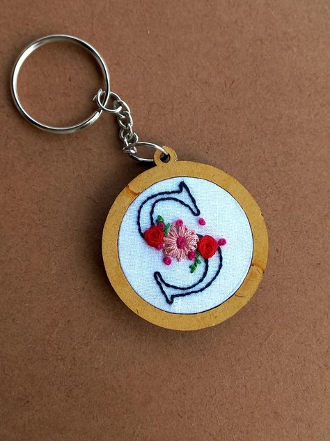 Hand embroidery Name initial floral keychain available in stock Hand Embroidery Keychain, Embroidery Keychain Patterns, Embroidery Keychain Diy, Keyring Embroidery, Hand Embroidery Names, Keychain Embroidery, Embroidery Jewellery, Embroidery Keychain, Tiny Embroidery