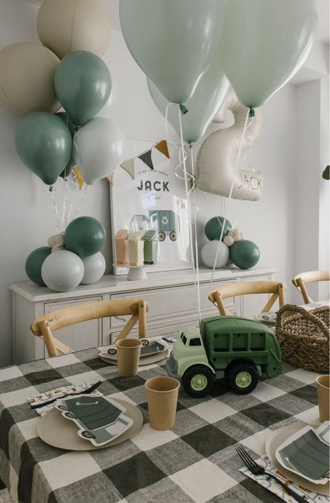 Pastel garbage truck-themed birthday setup with mini garbage can loot bags, custom cake toppers, and balloon bouquets. Truck Theme 1st Birthday Party, Trash Truck Balloon Garland, Garbage Truck Sensory Bin, Birthday Boy 2nd Party Themes, 2nd Boys Birthday Party Ideas, School Theme Birthday Party, Vehicle Party Theme, Trash Truck Birthday Party Decorations, Garbage Truck Theme Birthday Party