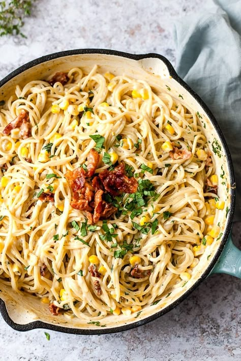 This creamy and healthy one-pot pasta is the perfect recipe for busy weeknights. This recipe uses frozen corn, salty bacon and other basic pantry staples to make life easy. I also give you the perfect ratio for making one pot pasta you'll always have a quick weeknight dinner on hand. #onepot #pasta #easyrecipe| saltedmint.com Corn And Bacon Pasta, Bacon Corn Pasta, Pasta And Corn Recipes, Corn Pasta Recipes, Corn And Pasta, Creamy Corn Pasta, Spicy Pad Thai, Pasta With Corn, Pasta Noodle Recipes