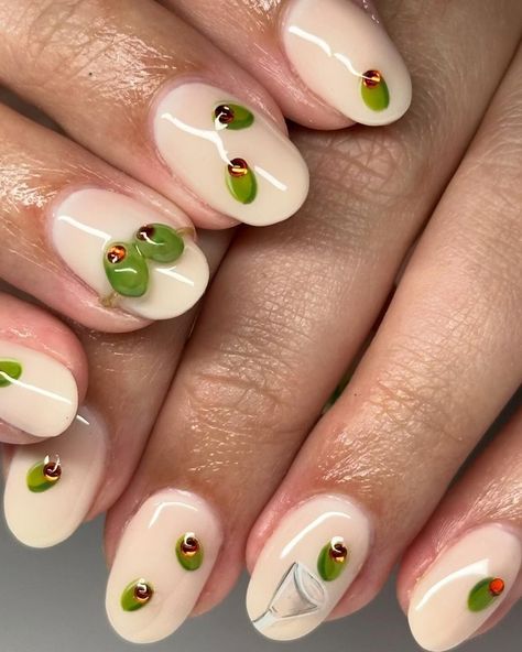 Neutrals for fall? Groundbreaking, we know. But the "dirty martini" manis taking over our feeds beg to differ. Check out the fun twist on the earth-toned nail-art look you'll be seeing everywhere this season, and get more inspo at our 🔗 in bio. 🍸🫒 📷: @nailsbysophiaf / @betina_goldstein / @paintedbypatt_ / @veedidem Olive Martini Nails, Martini Nail Art, Dirty Martini Nails, Earth Tones Nails, Olive Nail Art, Alcohol Nails, Green Olive Nails, Olive Nail Designs, Avocado Nails