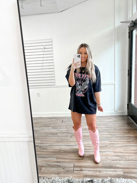 Oversized Graphic Tee & Pink Cowgirl Boots 💖 Oversized Shirt With Cowboy Boots, Oversized Tshirt Cowgirl Boots, Light Pink Cowboy Boots Outfit, Oversized Tshirt With Cowboy Boots, Festival Cowboy Boots, Pink Western Boots Outfit, Pink Cowgirl Boots Outfit, Pink Cowboy Boots Outfit, Pink Boots Outfit