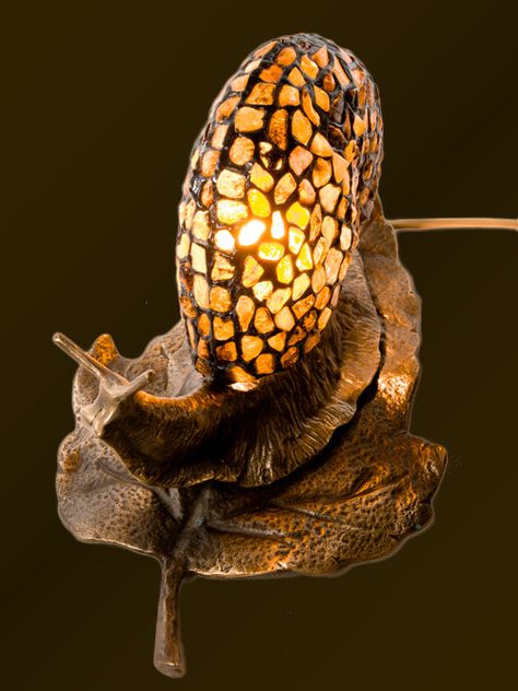 Snail amber lamp - made of polish amber Size: • Height approx 20 cm (8) • Diameter 32 cm (13) Cute stained glass lamp, made using L.C. Tiffany method of copper foil. We use Youghiogheny, Uroboros and Spectrum glass to make our pieces. You can ask us about specific lamps. We use Snail Lamp, Snail Decor, Amber Glass Lamp, Amber Lamp, Lime Green Bedrooms, Spectrum Glass, Snail Art, Stained Glass Lamp, Animal Lamp