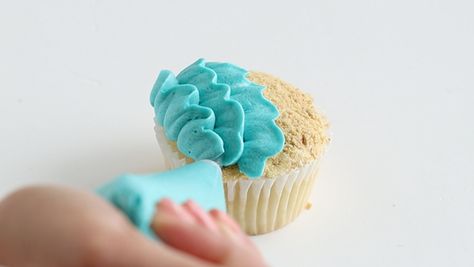 Beach Cupcakes | by Whitney DePaoli for TheCakeBlog.com Beach Cupcakes Ocean Themes, Beach Themed Cupcakes, Ocean Cupcakes, Beach Theme Cupcakes, Rosette Cupcakes, Whale Cakes, Tropical Cupcakes, Edible Sand, Beach Cupcakes