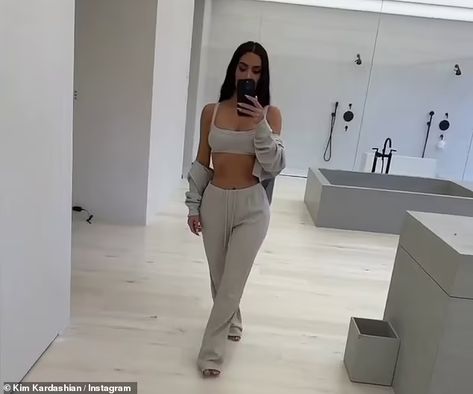 Kim Kardashian slips back into comfy SKIMS loungewear for selfie shoot in her HUGE bathroom... after being the belle of the ball at 43rd birthday party | Daily Mail Online Skims Kim Kardashian Pajamas, Daisy Wolanski, Huge Bathroom, 43rd Birthday, Pajamas Aesthetic, Kardashian Style, Kim Kardashian, Daily Mail, The Weekend